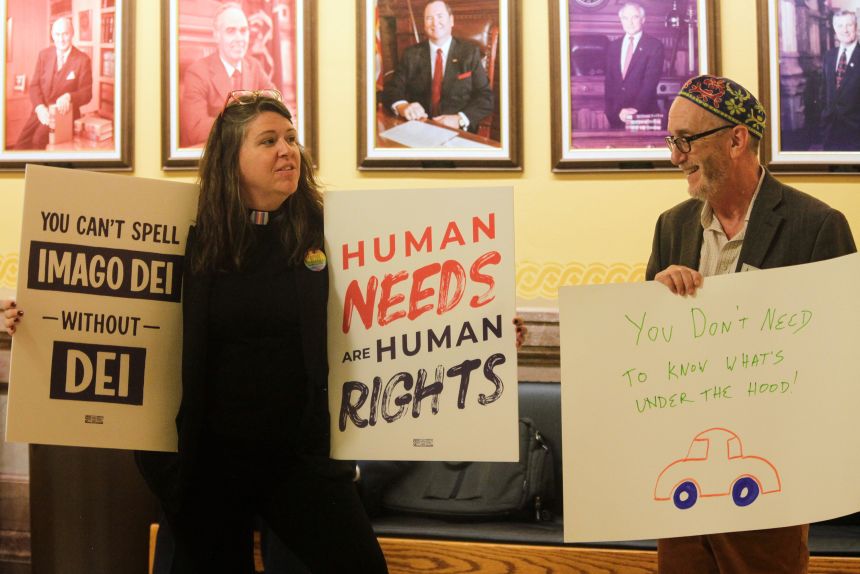 Rev. Dr. Mandy Todd, of Messiah Lutheran Church, and Rabbi Moti Rieber, right, executive director of Kansas Interfaith Action, protest SB 244 on February 16 outside the state senate chamber.